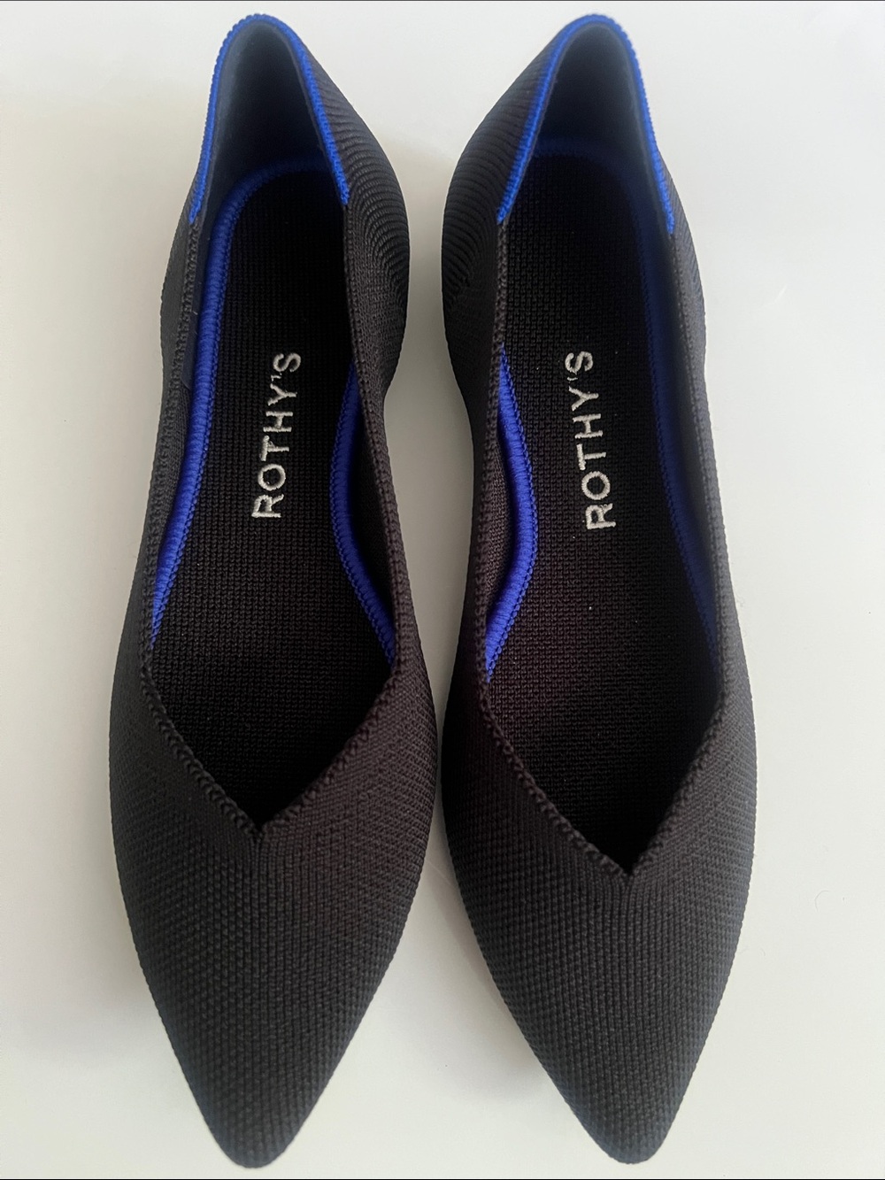 Rothy's Black Pointed Knit Flats with Blue Trim Accent